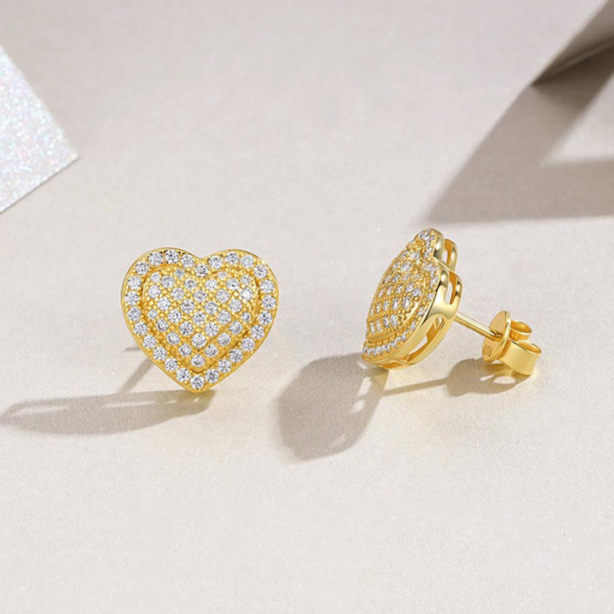Moissanite encrusted Heart Earstuds in 18k Gold covered 925 Silver